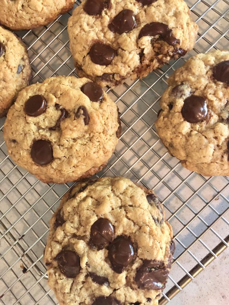 chocolate chip gluten free cookies resting on a backing rack